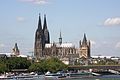 Cologne Cathedral (in the middle) and Great St. Martin Church right-hand in Cologne (Germany)