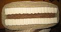 The cross-section of a mattress made of coconut fibres, a spcial foam and a mixture of hemp- and sheepwool