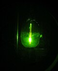 Close up to a lamp of a mercury-vapor lamp (View through a filter for welding)